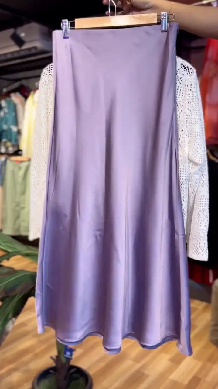 Lavender Satin A-Line Skirt Paired with a Delicate White Crochet